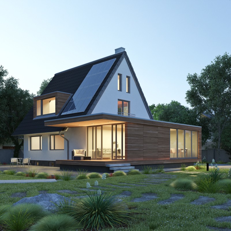 Haus mit Anbau am Abend